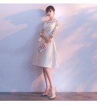 女裝禮服裙圓領蕾絲鏤空勾花中長裙