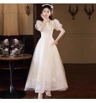 少女禮服裙方領蝴蝶結泡泡袖中長裙