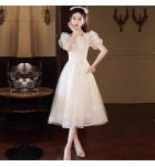 少女禮服裙方領蝴蝶結泡泡袖中長裙